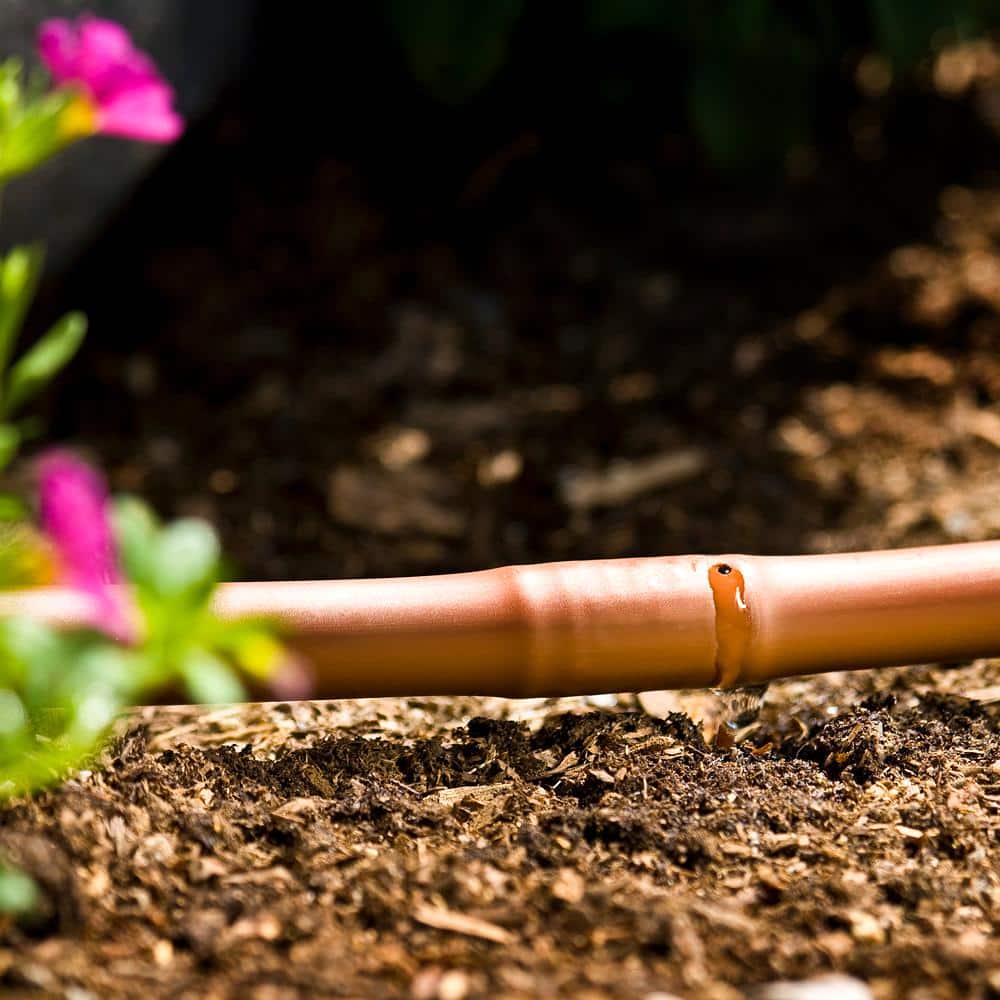 0.50 in. x 100 ft. Earthline Brown PC 1-GPH Pressure Compensating Drip or Emitter Line Tubing with 12 in. Spacing (.700) - Hercitys