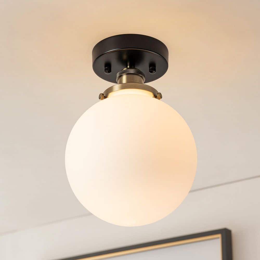 Charmaine 7.87 in. 1-Light Modern Charming Antique Brass with Matte Black Opal Glass Semi-Flush Mount Light - Hercitys