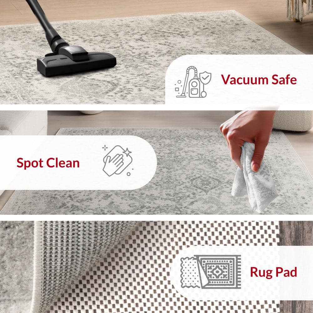 Odell Faded Vintage Ivory 5 ft. x 7 ft. 5 in. Area Rug - Hercitys