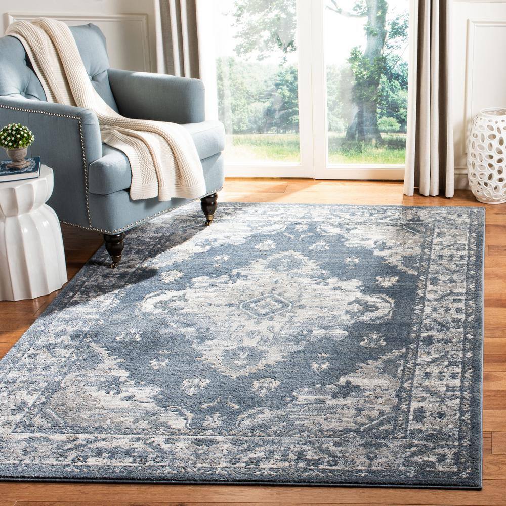 Oregon Blue/Cream 5 ft. x 7 ft. Distressed Floral Medallion Area Rug - Hercitys