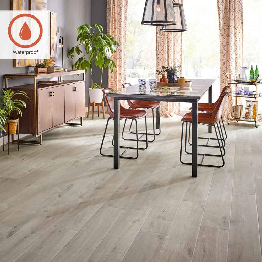 Outlast+ Graceland Oak 12 mm T x 7.4 in. W Waterproof Laminate Wood Flooring (16.93 sqft/case) - Hercitys
