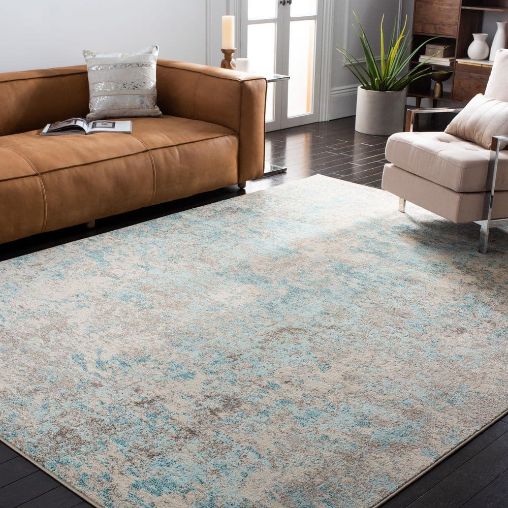 Madison Ivory/Teal 9 ft. x 12 ft. Geometric Abstract Area Rug - Hercitys