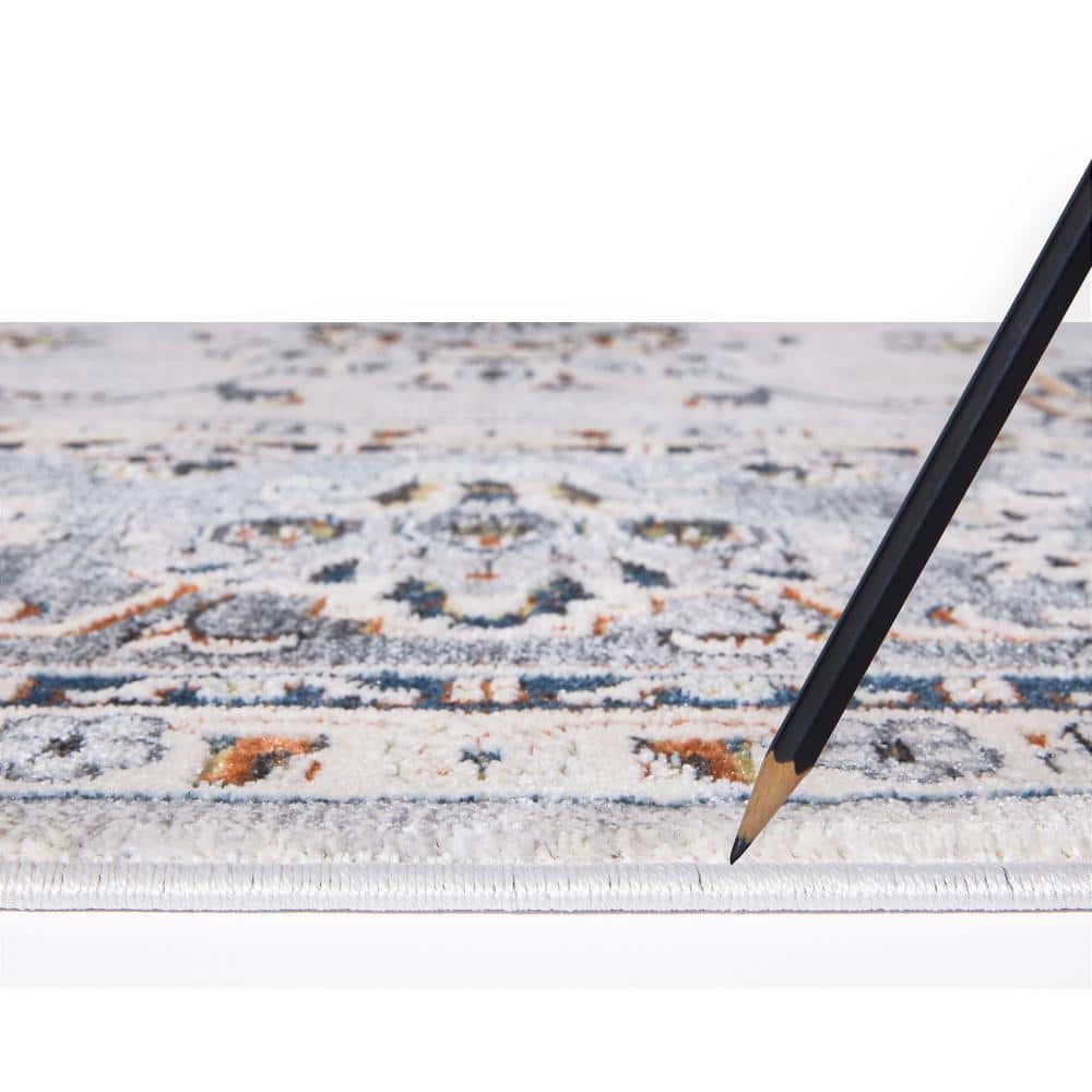 Carlisle Ivory 5 ft x 6 ft 8 in Area Rug - Hercitys