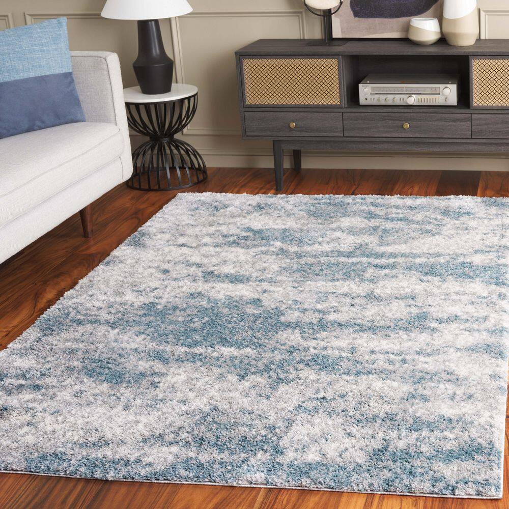 Berber Shag 5 ft. x 7 ft. Ivory/Blue Abstract Marle Area Rug - Hercitys