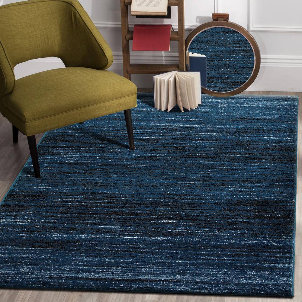 Myra Distressed Soft Blue/Black 5 ft. 2 in. x 7 ft. 2 in. Rectangle Indoor Area Rug - Hercitys