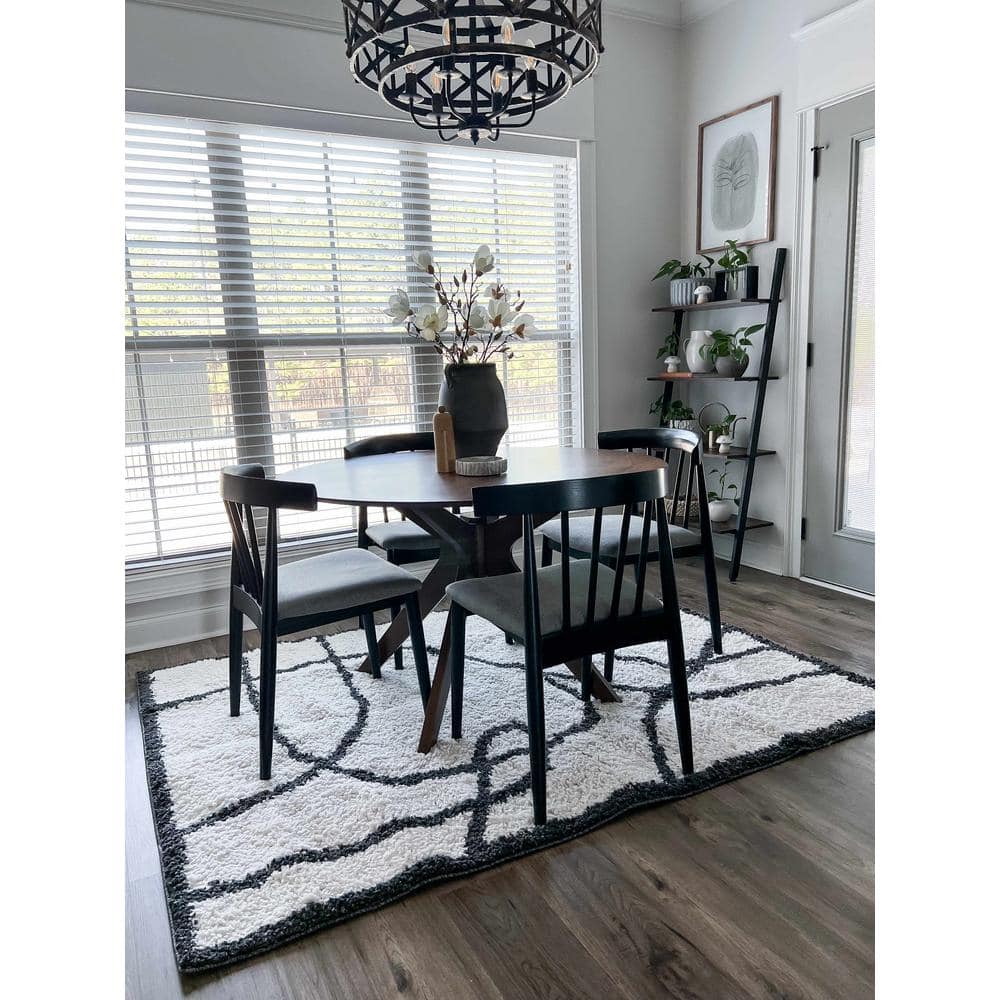 Brad 5 ft. X 7 ft. White, Black Area Rug - Hercitys