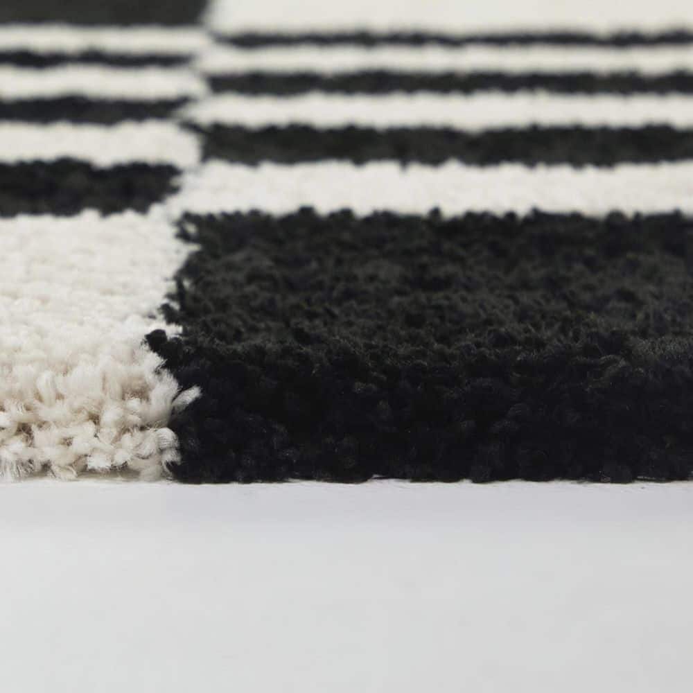 Elara Cream 5 ft. 3 in. x 7 ft. Geometric Area Rug - Hercitys