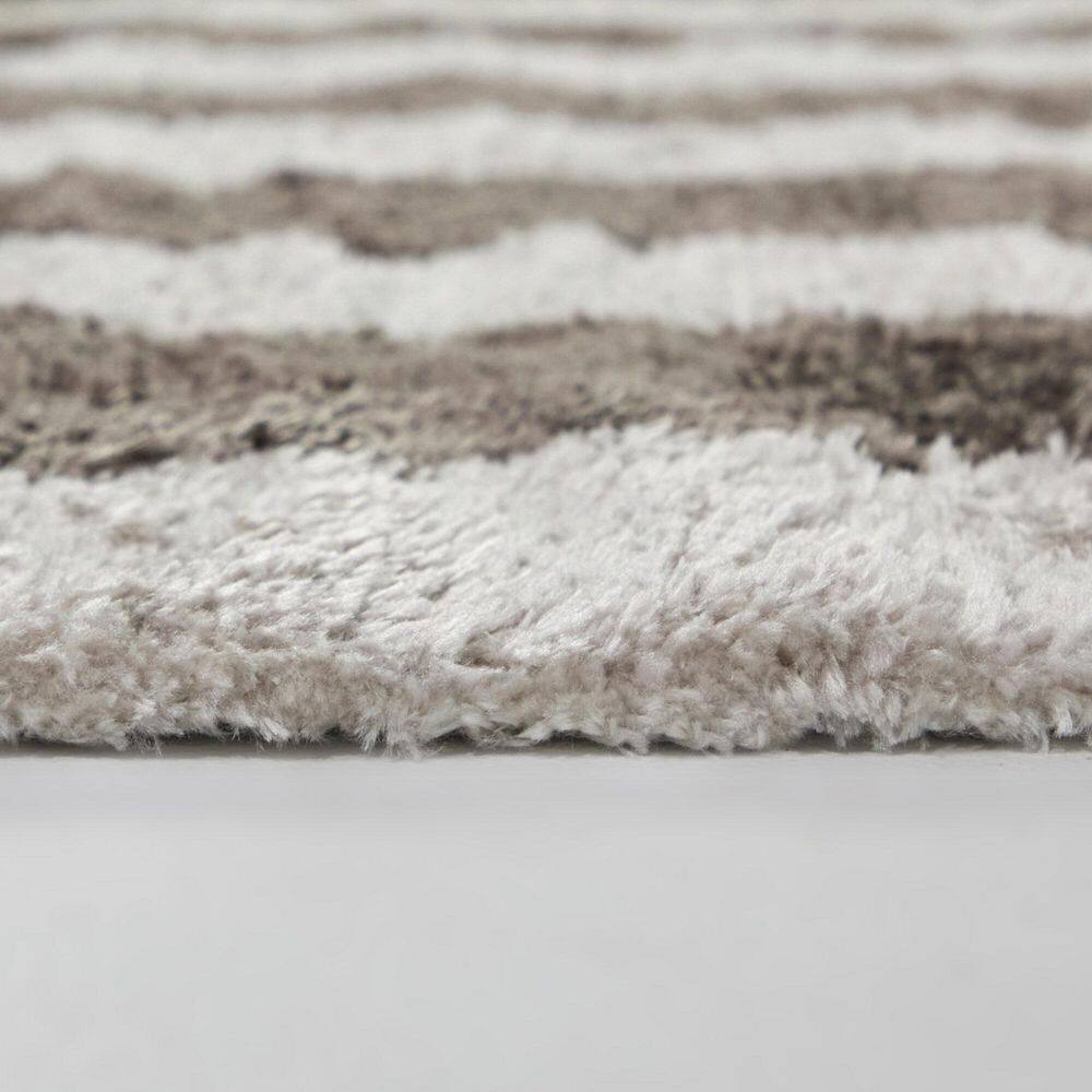 Edan Brown 5 ft. 3 in. x 7 ft. Striped Area Rug - Hercitys