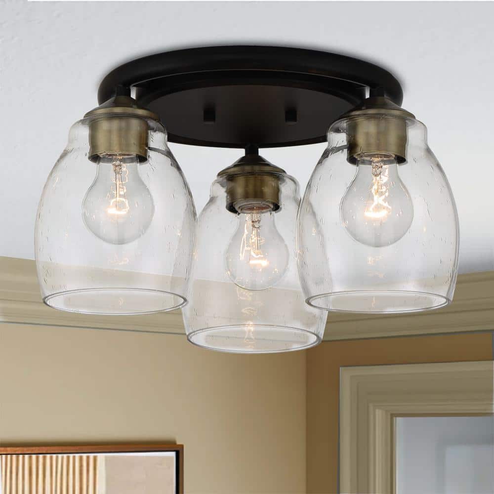 Winsley 15 in. 3-Light Black with Stained Brass Flush Mount with Clear Seeded Glass Shades - Hercitys