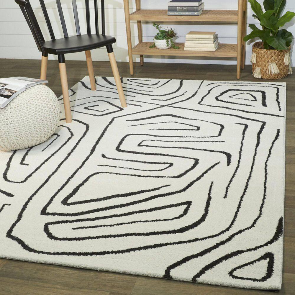 Pollock Cream 5 ft. 3 in. x 7 ft. Abstract Area Rug - Hercitys