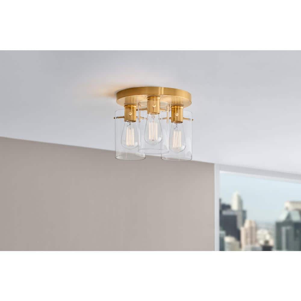 Regan 11.75 in. 3-Light Brushed Gold Flush Mount with Clear Glass Shades - Hercitys