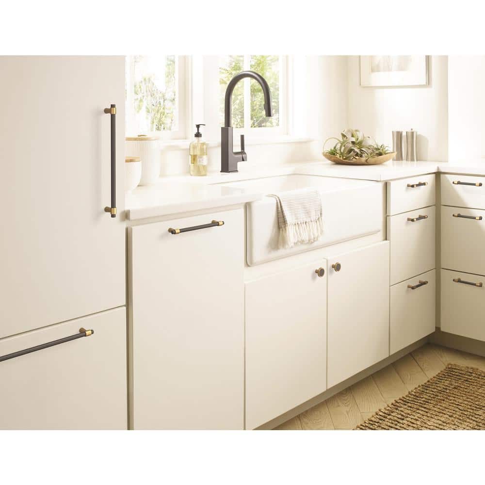 Mergence 1-3/8 in. (35mm) Modern Matte Black/Champagne Bronze Round Cabinet Knob - Hercitys