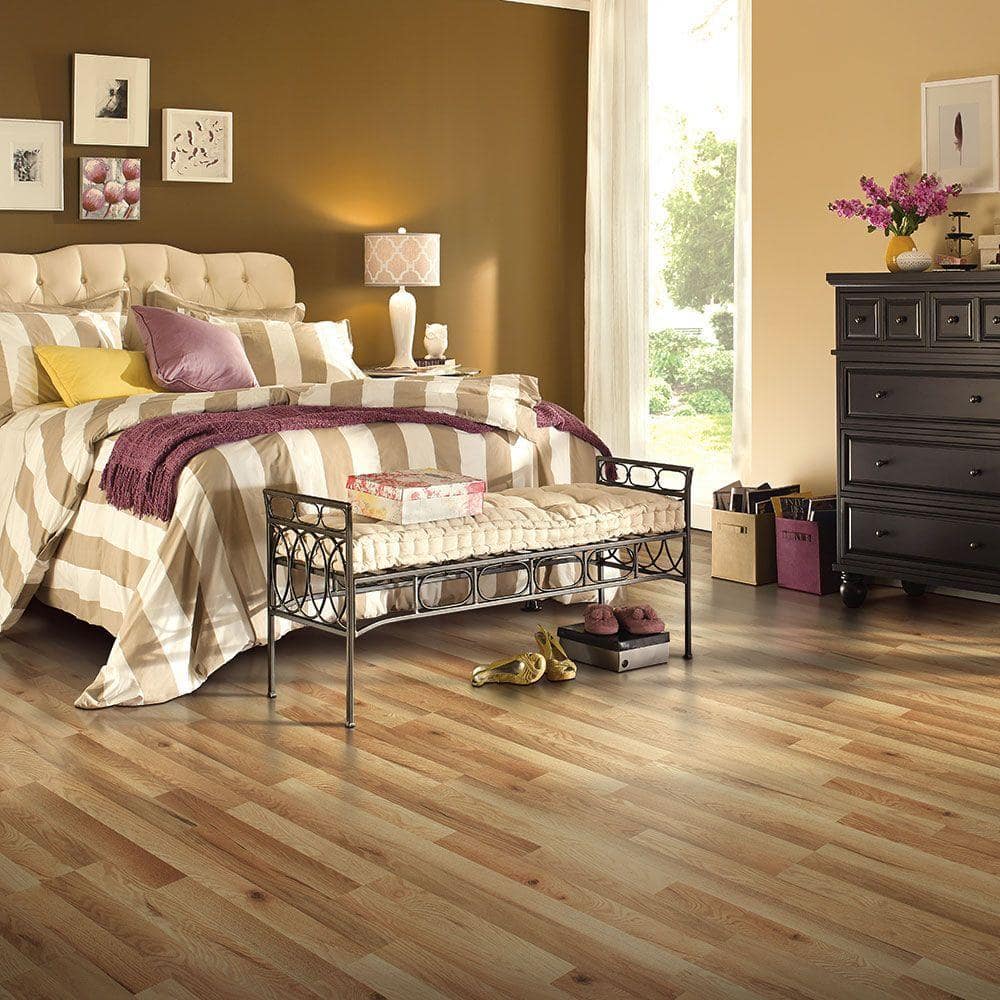 XP Haley Oak 10 mm T x 7.4 in. W Water Resistant Laminate Wood Flooring (19.63 sq. ft./case) - Hercitys
